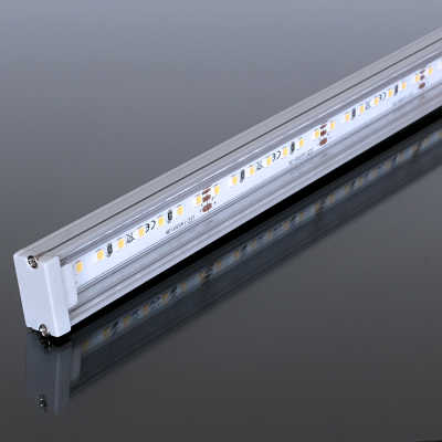 LED-Leiste flach wasserdicht "Out-Line IP54" 140x 2835 LEDs - 20 Watt - 1777 Lumen je Meter | transparent | warmweiß CRI 90Ra - 120° 24VDC |