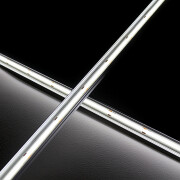 wasserdichte COB LED-Leiste Out-Line IP54 – transparent dimmbar – 528x LED Chips – tageslichtweiß 6500 K – CRI93 24V DC 180° – 13 W – 1277 lm/m